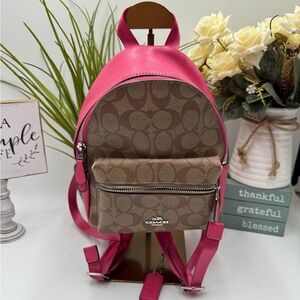 COACH Mini Charlie Backpack in Signature Canvas with Pink Leather